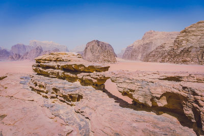 Scenic view of rock formation against sky