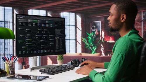 Side view of man working in office