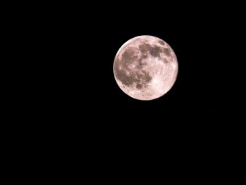 Full moon against clear sky at night