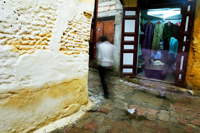 Man standing by building