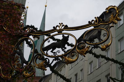 Low angle view of ornate building against sky