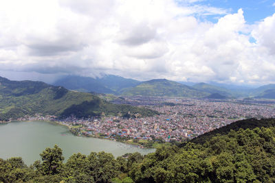 Scenic view of landscape and mountains against sky