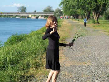 Full length of woman standing on land