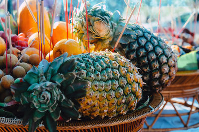 Close-up of pineapple for sale at market stall