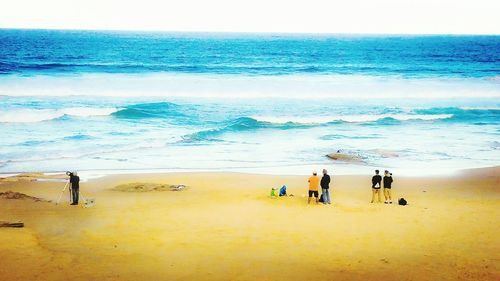 Tourists enjoying at beach