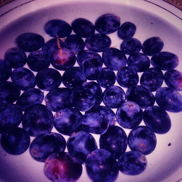 food and drink, food, freshness, fruit, healthy eating, blueberry, indoors, berry fruit, bowl, large group of objects, still life, abundance, ready-to-eat, grape, close-up, sweet food, berry, high angle view, raspberry, blackberry - fruit