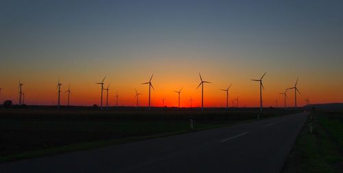 Empty country road at sunset