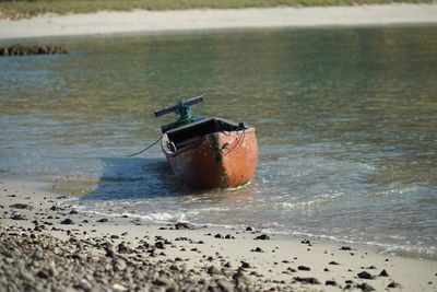 Nautical vessel on sea shore