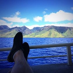 Scenic view of lake with mountains in background