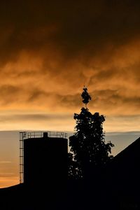 Low angle view of cloudy sky at sunset