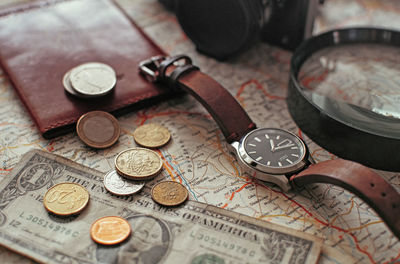 High angle view of coins on table