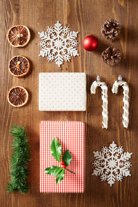 Directly above shot of christmas decorations on wood