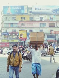 People standing on street in city