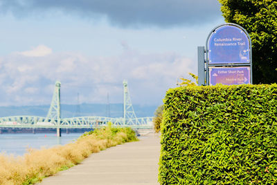 View of bridge against cloudy sky