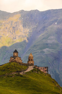 Historic building against mountain range