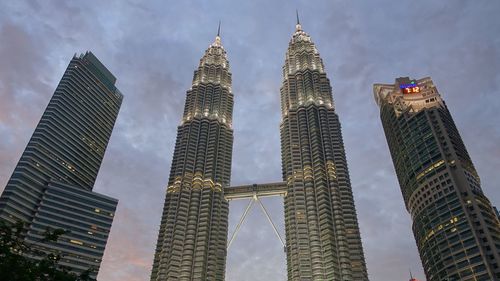 Low angle view of modern buildings against sky