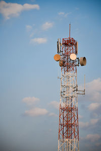 Low angle view of electricity pylon against sky