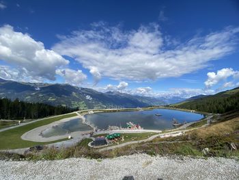 Scenic view of landscape against blue sky