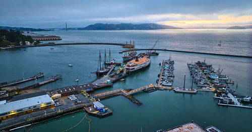 High angle view of boats moored at harbor