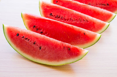 High angle view of fruit slices on table