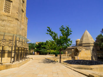 Low angle view of historic building against clear sky