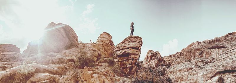 Low angle view of rocks against sky