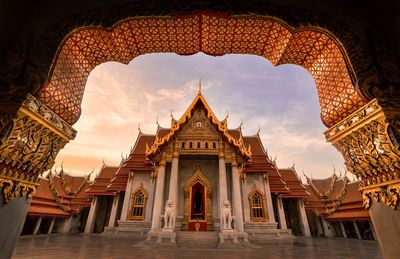 Temple building against sky