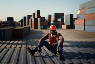 Engineer sitting at harbor