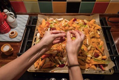 Female hands preparing food