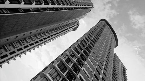 Low angle view of modern buildings against sky