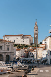 Boats moored in marina in idyllic coastal town of piran in slovenia