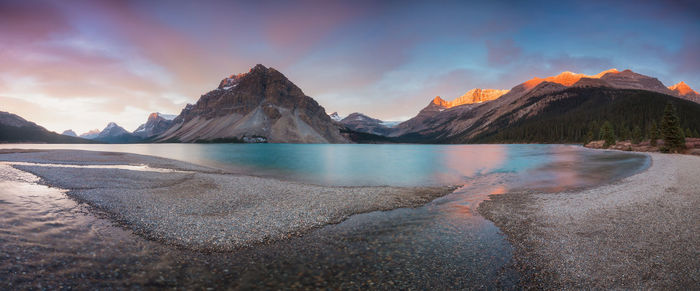 Scenic view of lake against sky during sunset