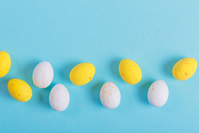 High angle view of pills against blue background