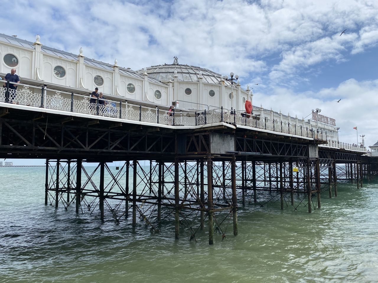 water, pier, architecture, sky, sea, built structure, vehicle, nature, cloud, transportation, transport, day, travel, travel destinations, mode of transportation, no people, outdoors, waterfront, building exterior, bridge, nautical vessel, tourism, waterway, coast, stilt house, boat