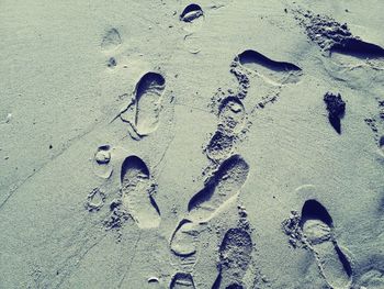 Text on sand at beach