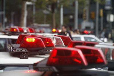 Close-up of red car in city at night