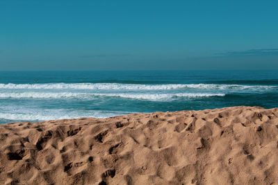 Scenic view of sea against clear sky