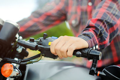 Close-up of man riding motorcycle