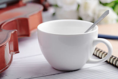 Close-up of coffee cup on table