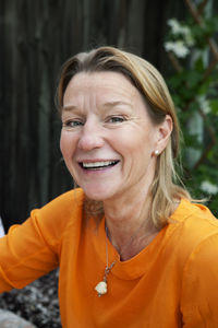 Portrait of smiling mature woman, sweden