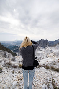 Rear view of woman looking at landscape