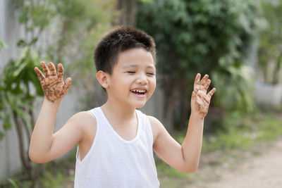 Happy boy enjoying in park