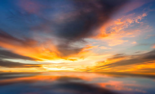 Scenic view of dramatic sky during sunset