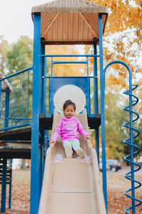 Full length of cute girl in playground