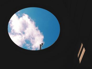 Low angle view of building against cloudy sky