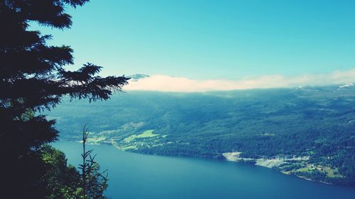 High angle view of trees and mountains against sky