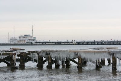 View of harbor against clear sky