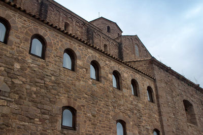 Low angle view of old building against sky