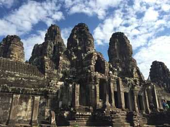 Low angle view of angkor wat against sky