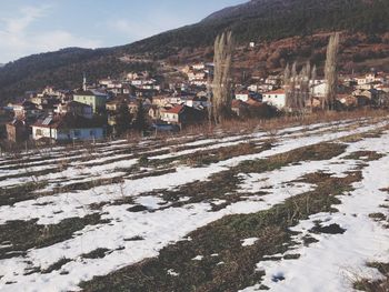 View of buildings in a village during winter